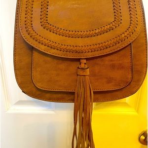 Brown crossbody bag with tassel